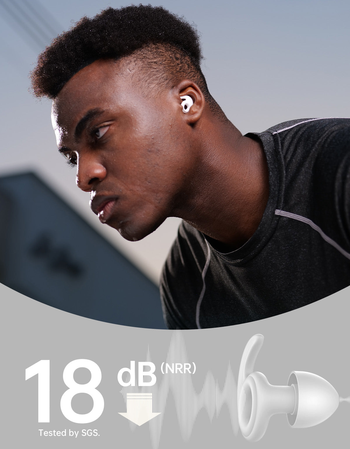 Man wearing earplugs of -18 dB NRR SGS tested  